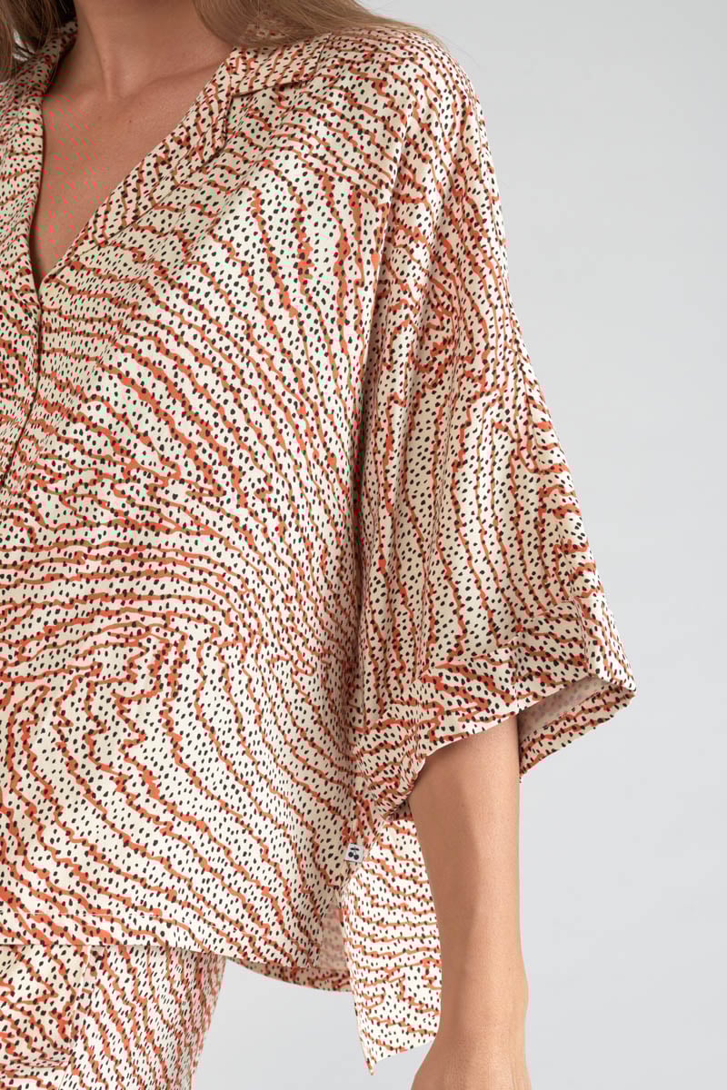 Blouse Freila à motif orange et noir