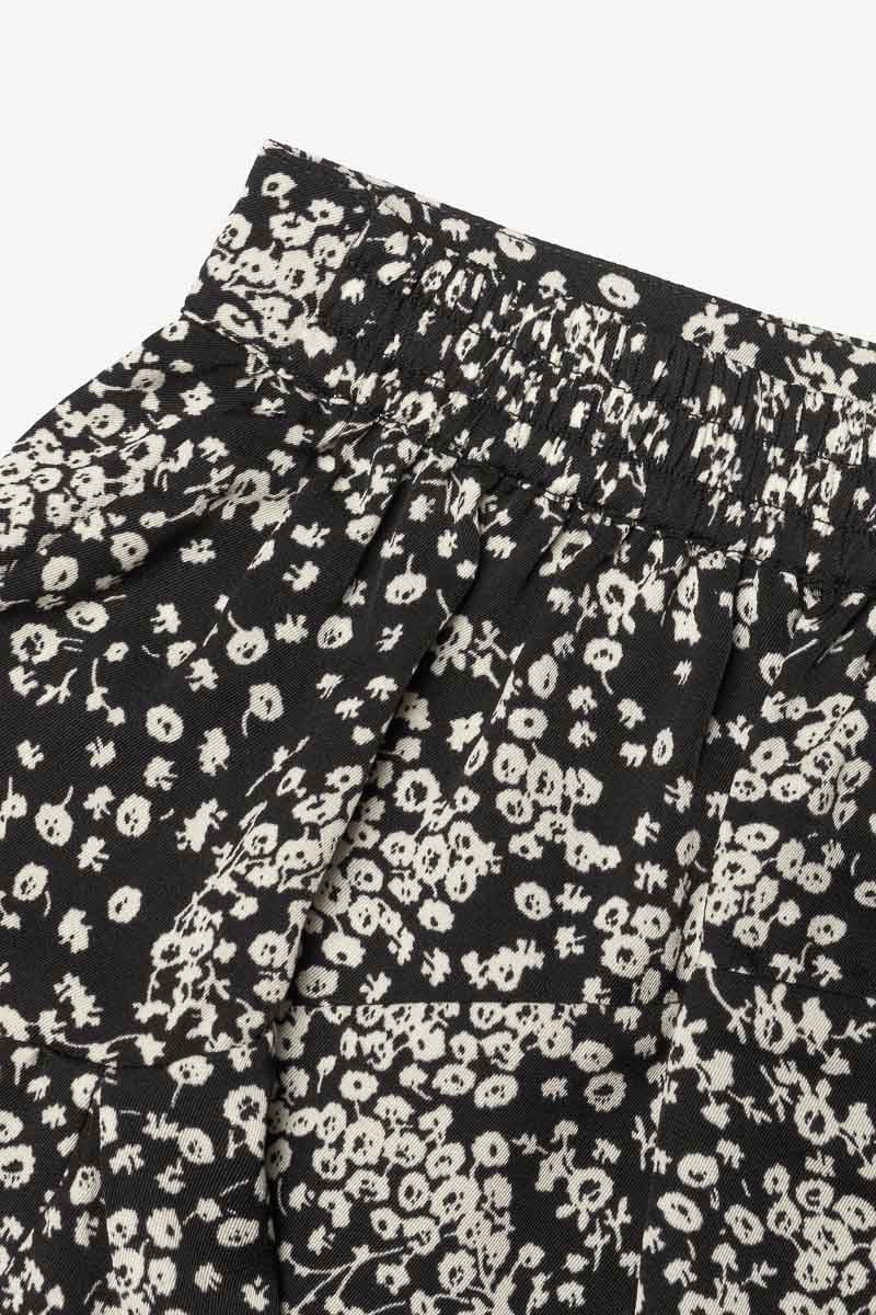 Jupe short Cassandgi à motif floral noir et blanc
