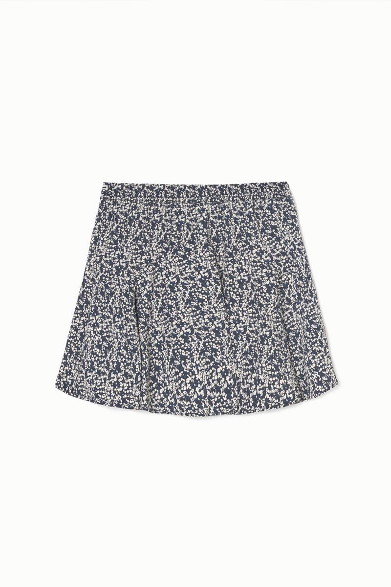 Jupe short Onourisgi à motif floral bleu nuit et blanc