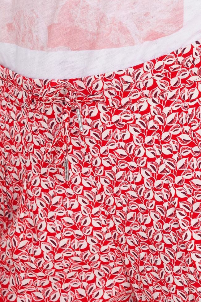 Pantalon Burgos rouge à motif feuilles