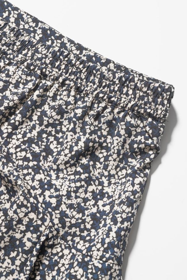 Jupe short Onourisgi à motif floral bleu nuit et blanc